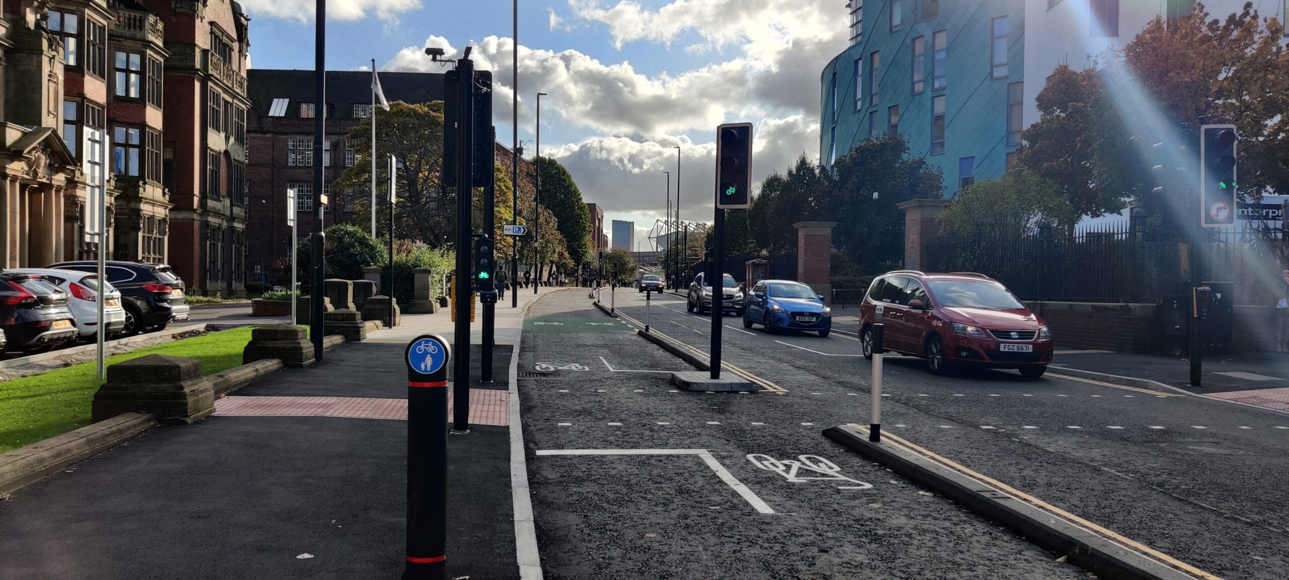 View of Queen Victoria Road, Newcastle looking southbound showing the resurface pavement, cycle track and road outside the RVI hospital.