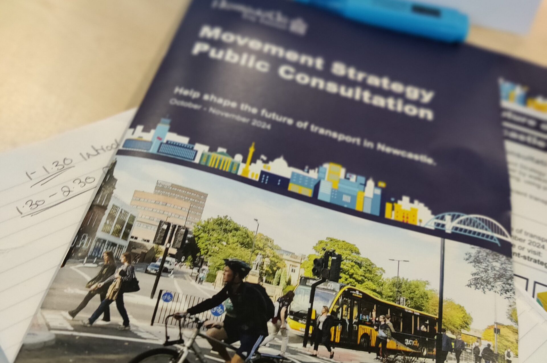 A picture of the Newcastle City Council Movement Strategy Document placed on a desk.