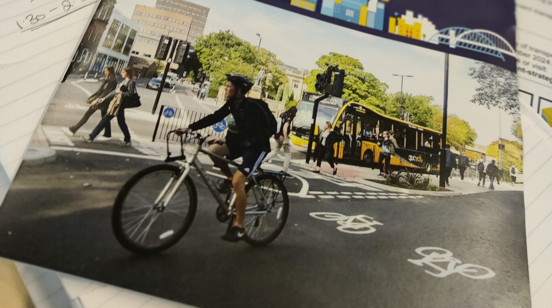 Front cover of Newcastle City Council's Movement Strategy. There is a person cycling on a cycle track.